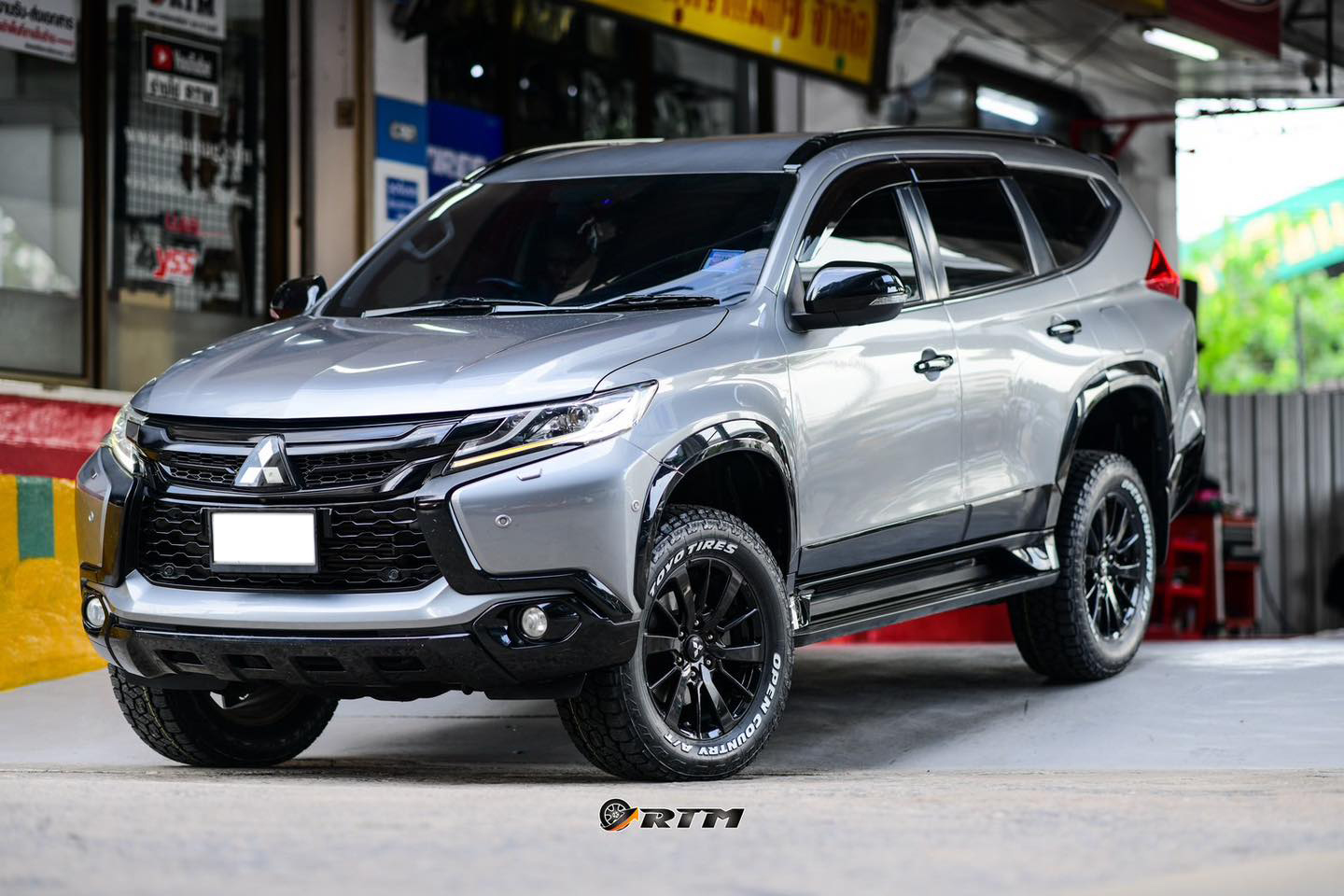 Mitsubishi Pajero Sport ติดตั้ง Open Country AT3 White Letter